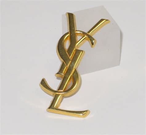 ysl broch|yves saint laurent brooch.